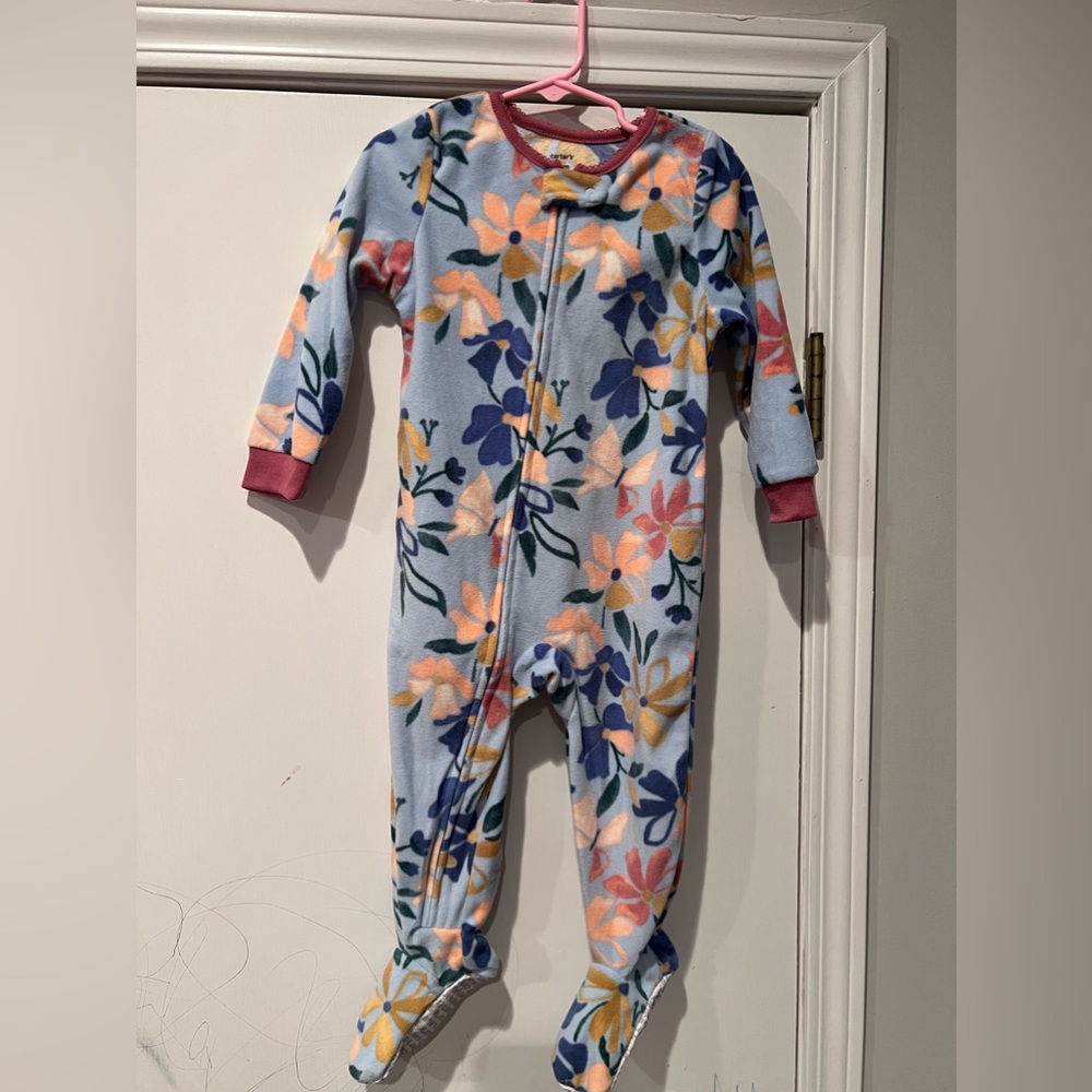 Three pieces of girls Carter’s pajamas size 24 months. Like new!